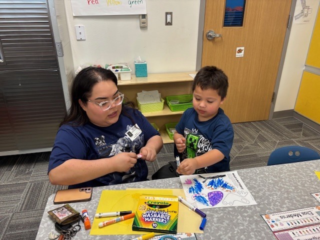 Pre-K students working on thanksgiving parade