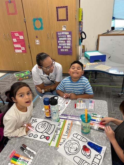 Pre-K students working on thanksgiving parade