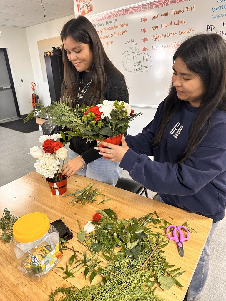 Floral design students working on bulldog blooms orders