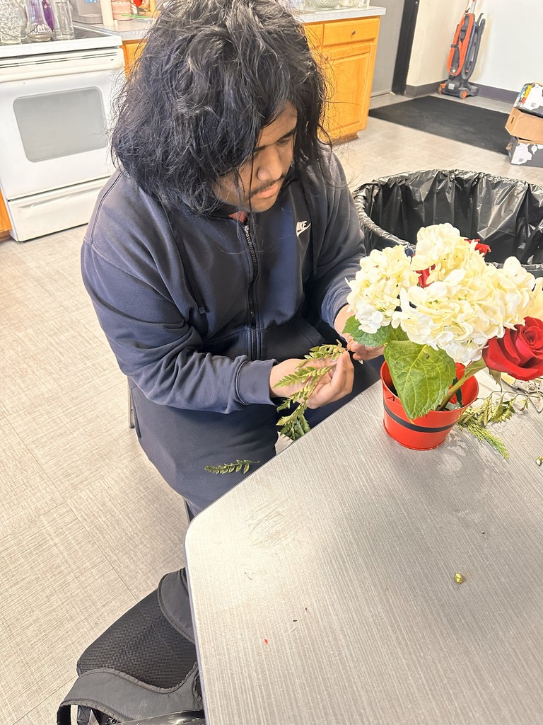 Floral design students working on bulldog blooms orders