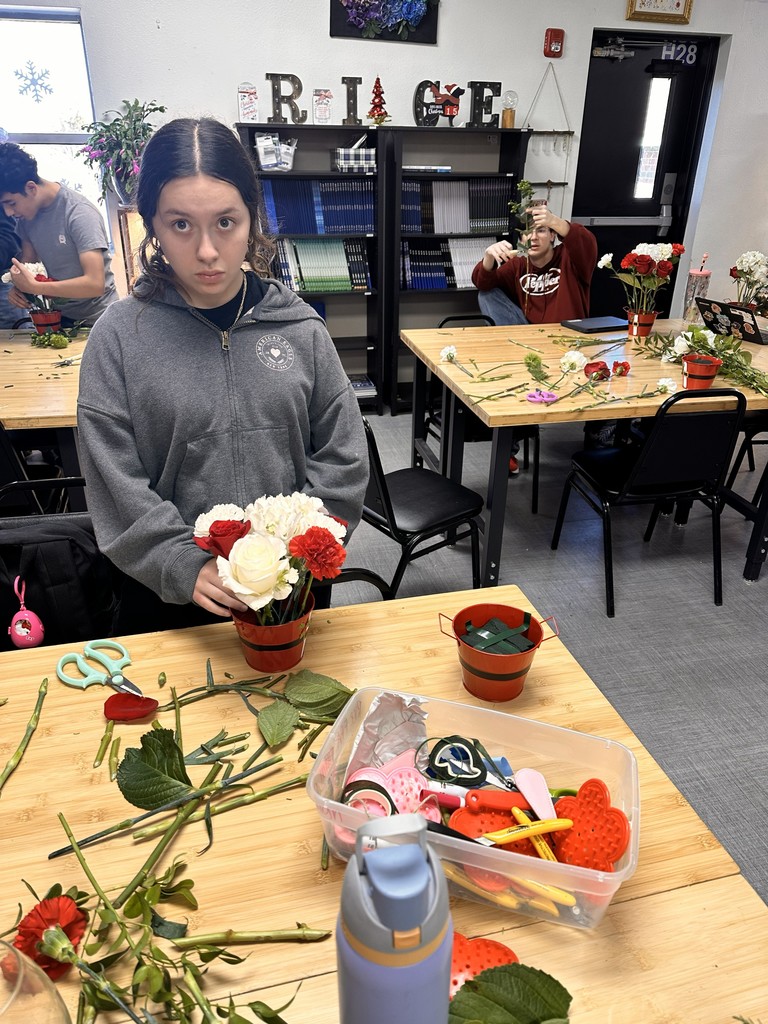 Floral design students working on bulldog blooms orders