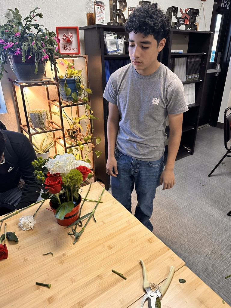 Floral design students working on bulldog blooms orders