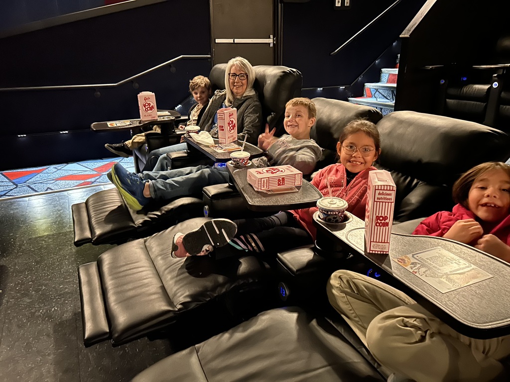 2nd graders on a field trip to the movie