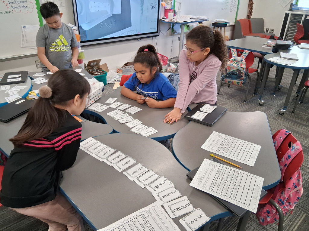 2nd graders working on prefixes