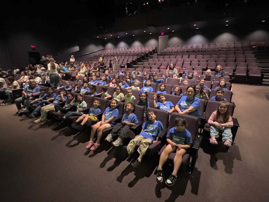 Kindergarten students watching a play