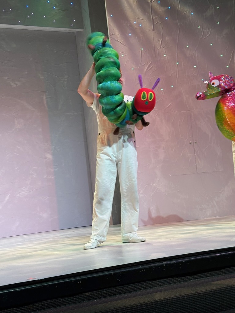 Kindergarten students watching a play