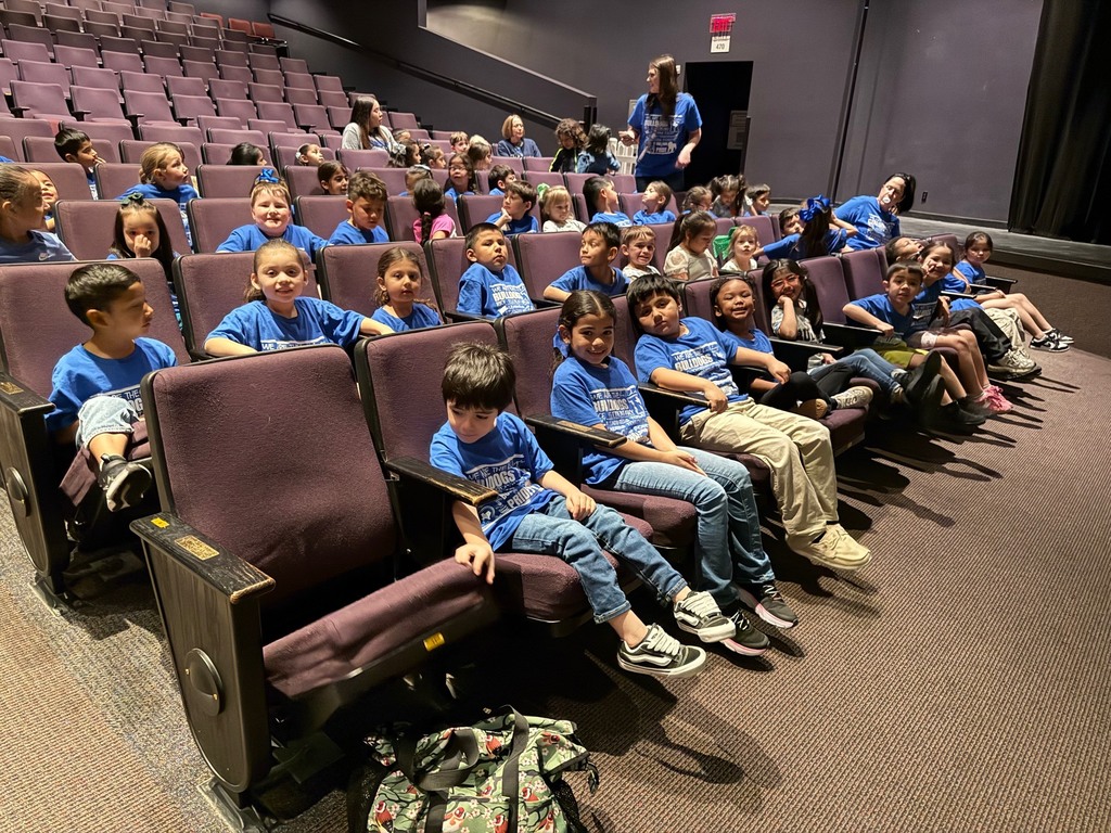 Kindergarten students watching a play