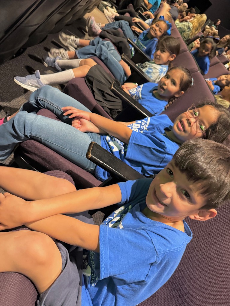 Kindergarten students watching a play