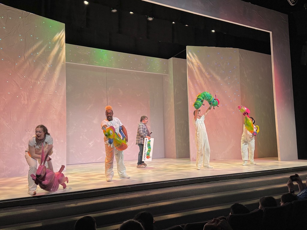 Kindergarten students watching a play