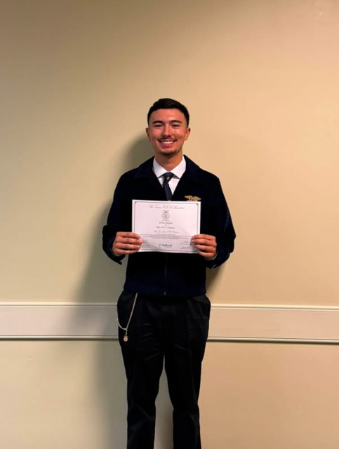 Brian Zagala receiving his Lone Star FFA degree