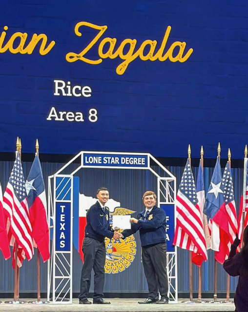 Brian Zagala receiving his Lone Star FFA degree