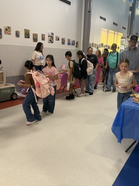 goodies with grandparents at the Elementary