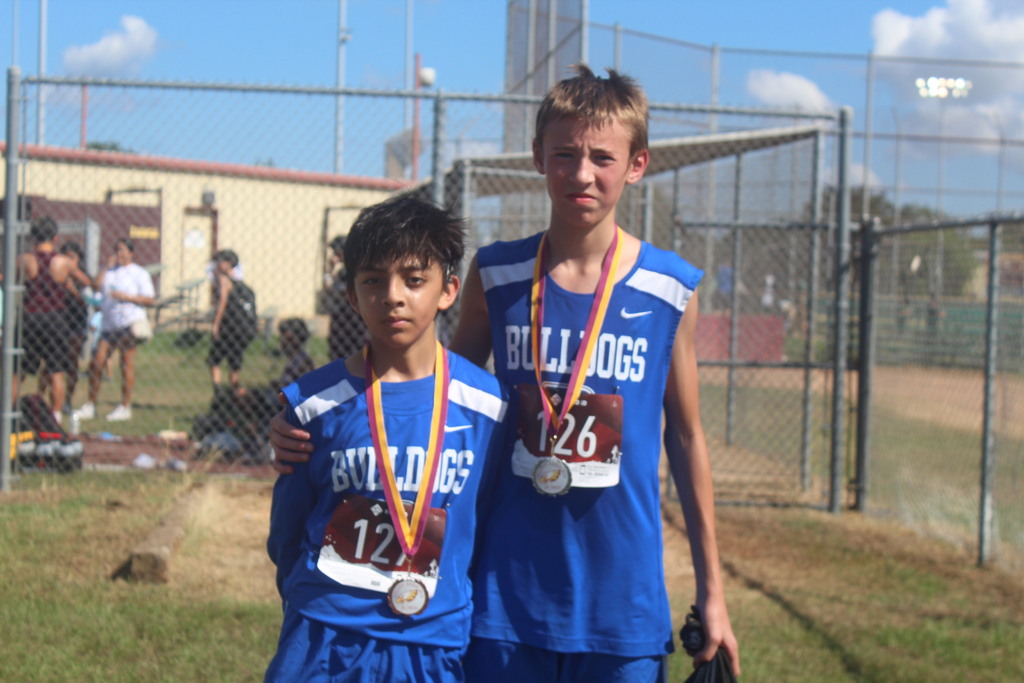 Jh cross country runners with medals