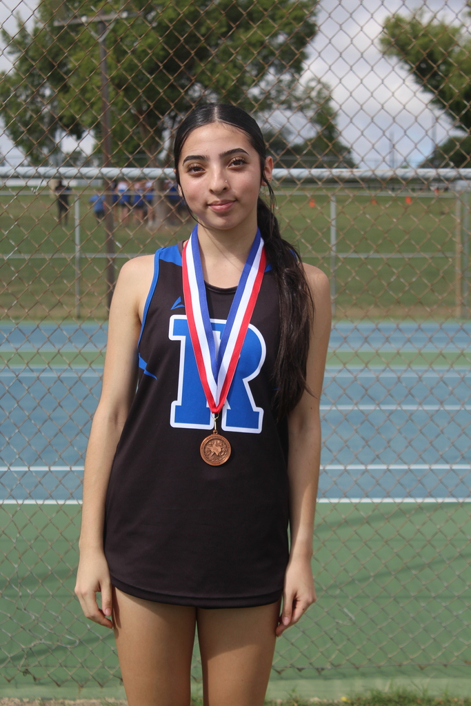 Cross country girl with medal