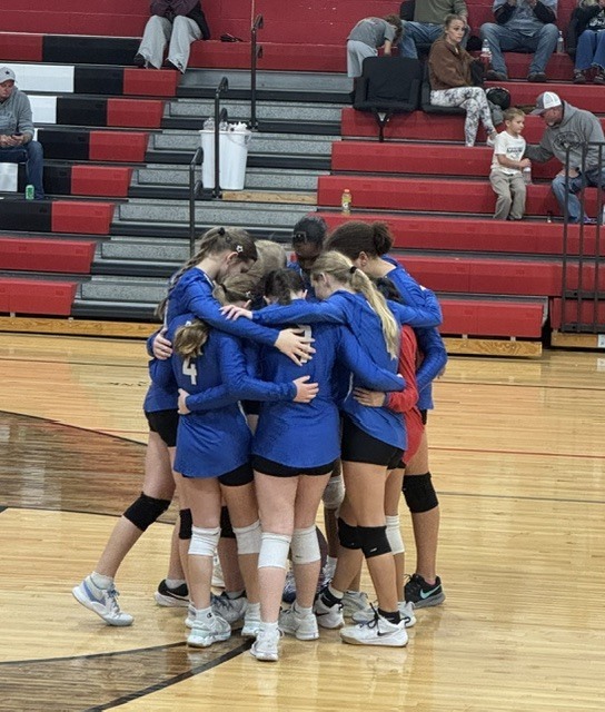 IMS a team in huddle