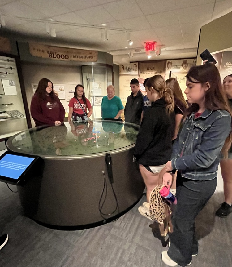 Students viewing the Battle diorama map  
