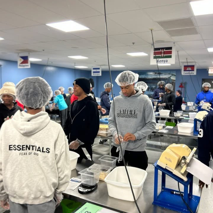 Male Mentoring service project at Feed My Starving Children