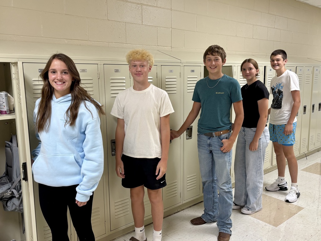 Officially in high school - 9th graders by their lockers