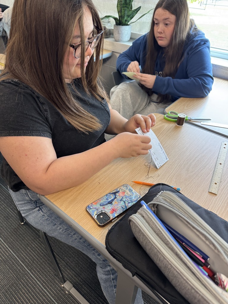 Learning to hand sew in Intro to FCS 1