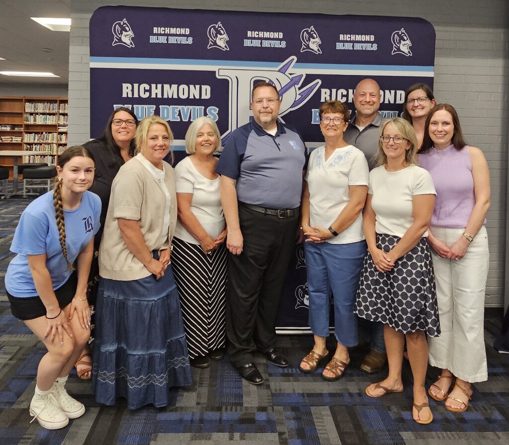 Mr. Walmsley picture with board members