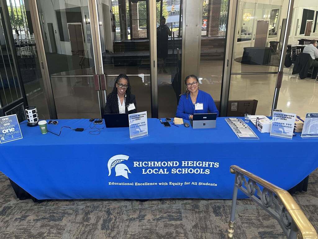 Photo of collegues at the host table for the Instructional Round through the Ohio Midsize School Districts Leadership Collaborative (OMSDLC)