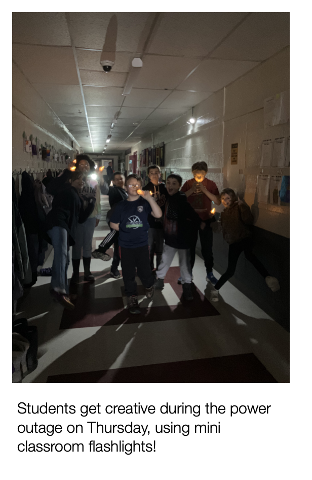 students with flashlights