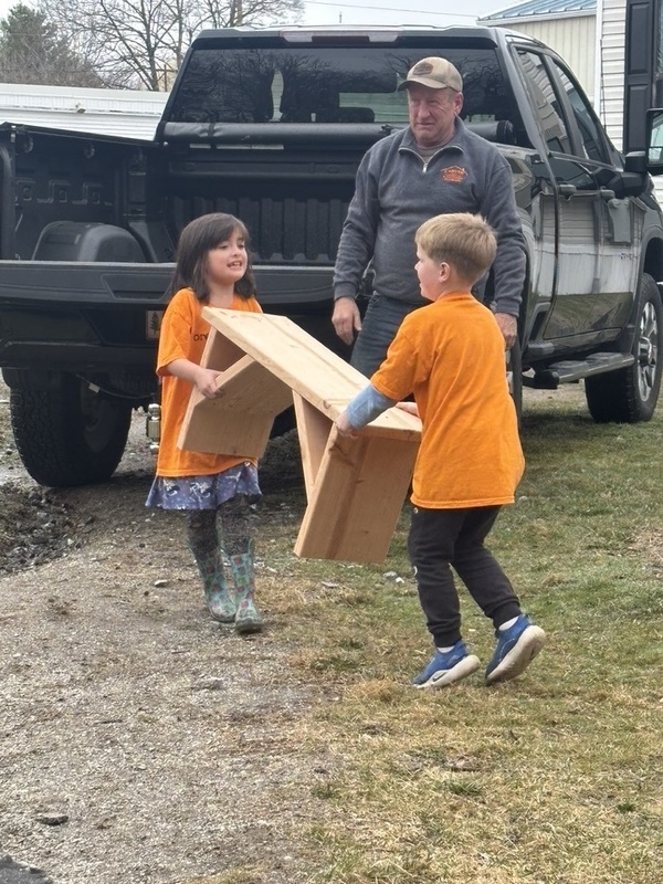 Kids moving new benches