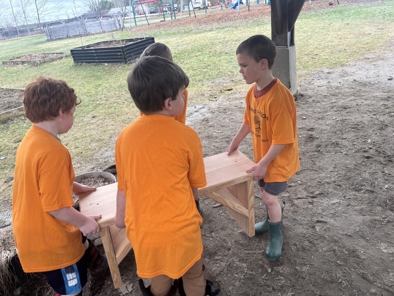 Kids moving new benches