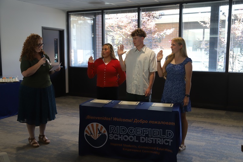 Superintendent Dr. Jenny Rodriquez swears in the new student representatives at the board meeting