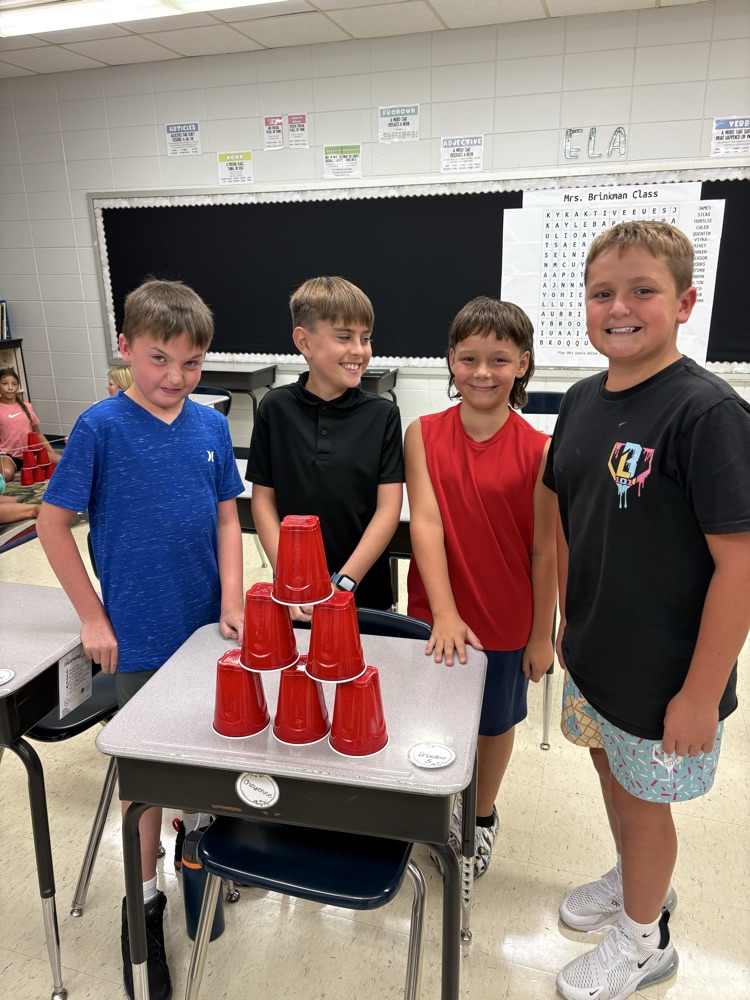 group of kids with completed stack