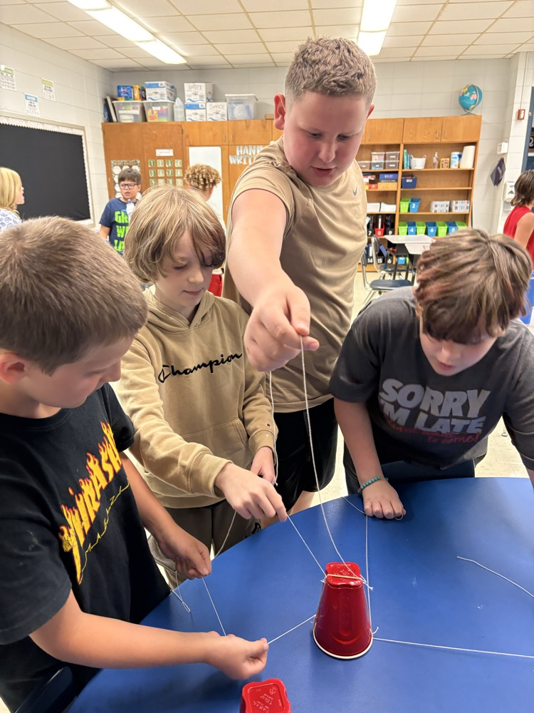 group of kids with completed stack