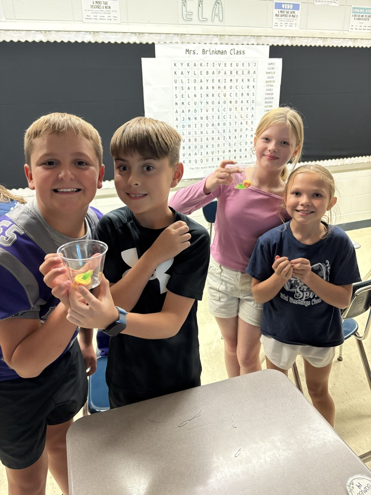 students saving gummy worm