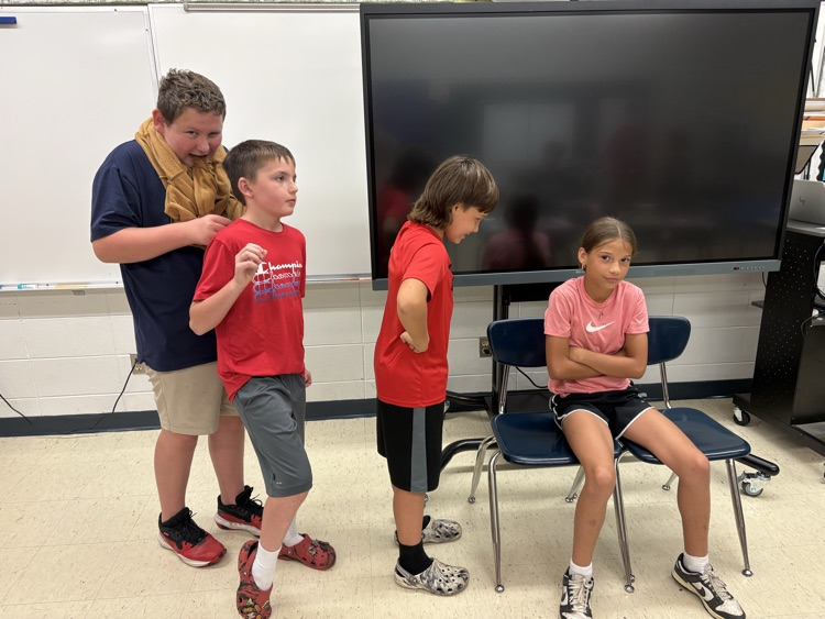 Kids acting a tableau