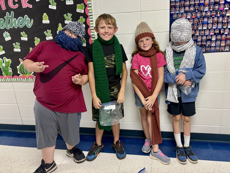 students in hats and scarves