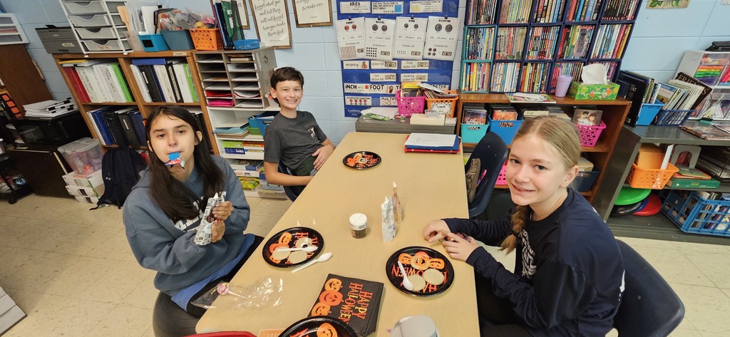 Students decorating cookies.