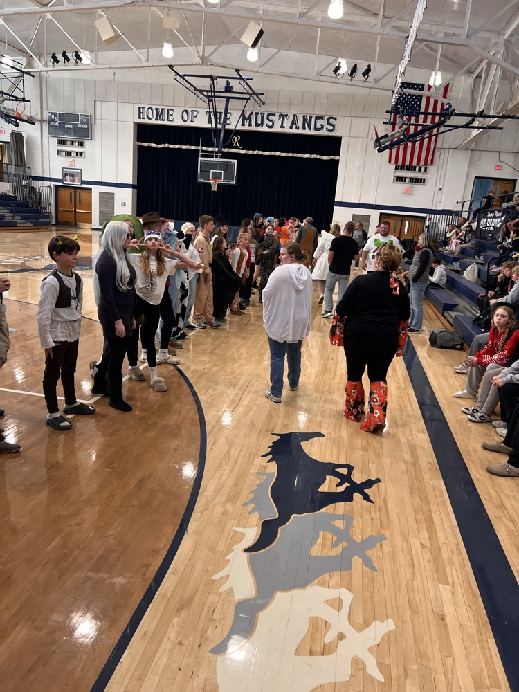 Teachers judging costumes