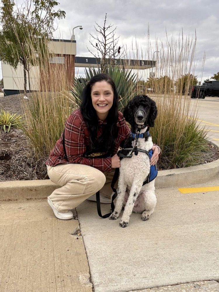 Marshall and handler at testing facility 