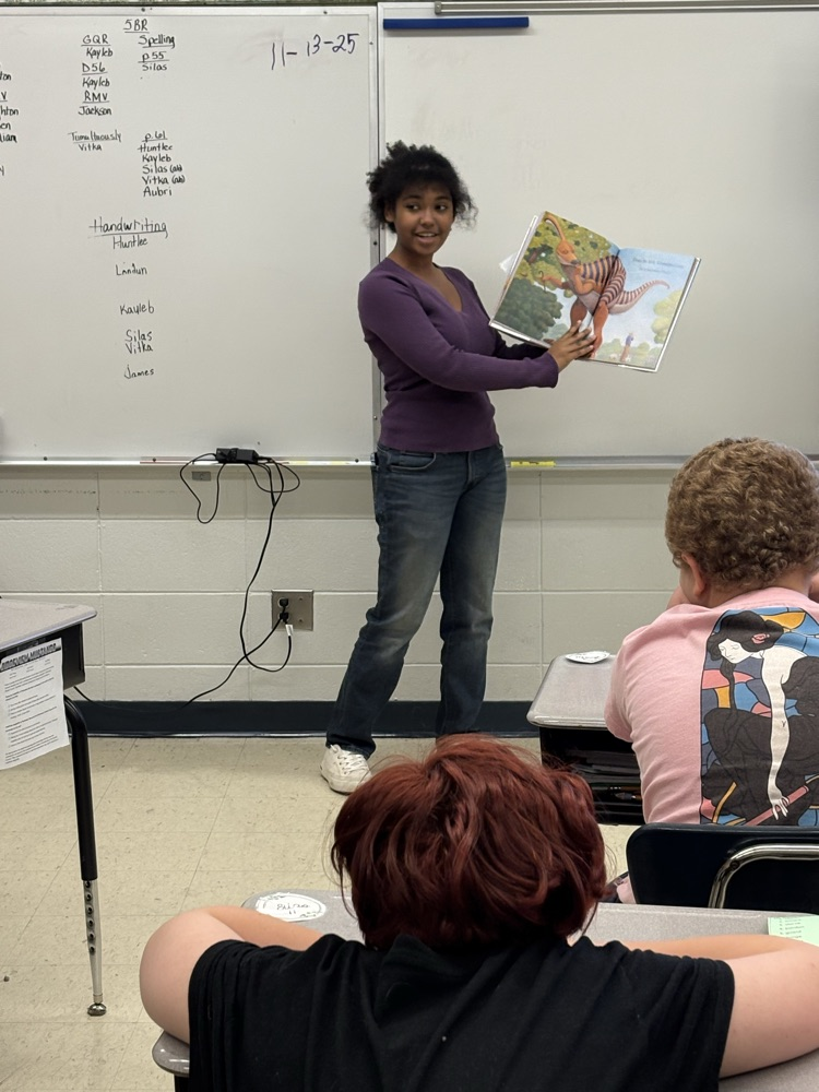 Chay reading a book to 5BR