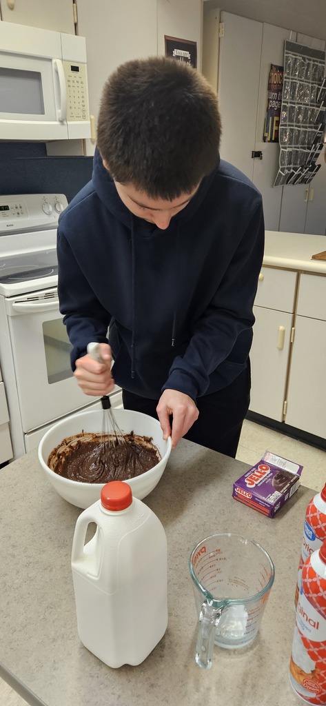 Students making a pie.