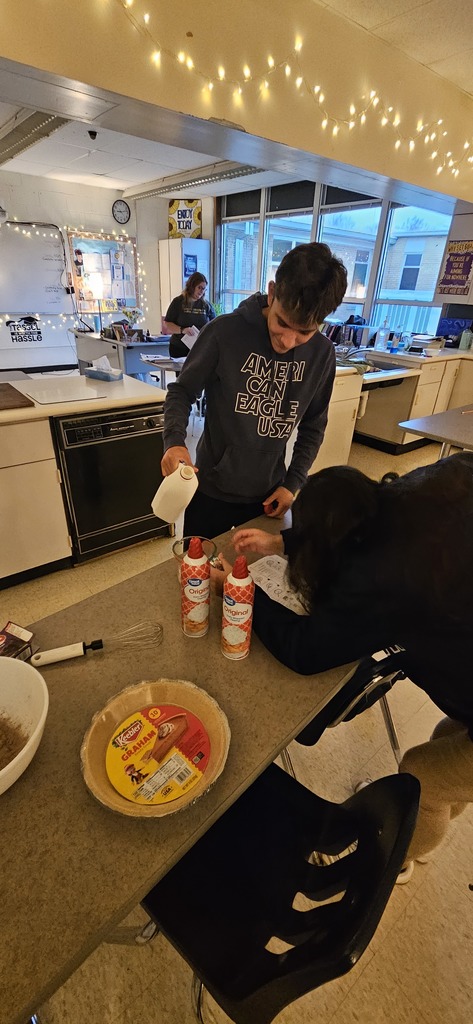 Students making a pie.
