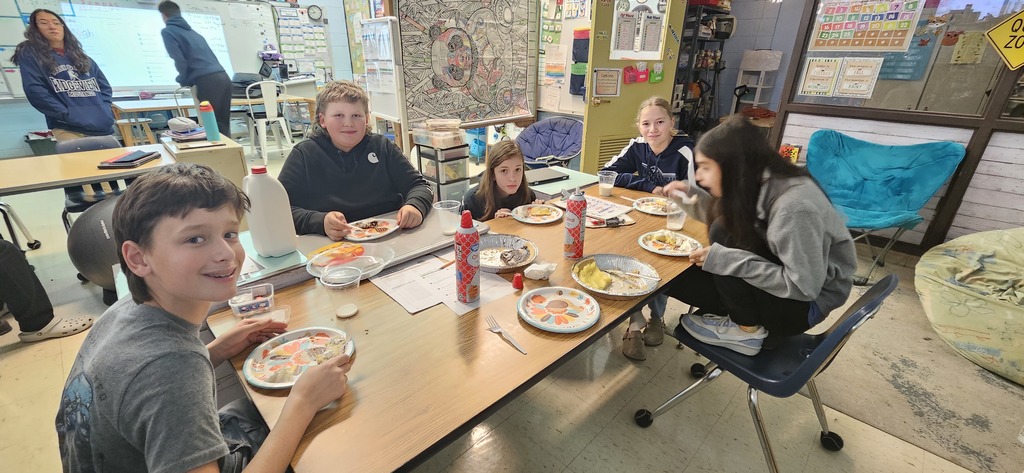 Students making a pie.