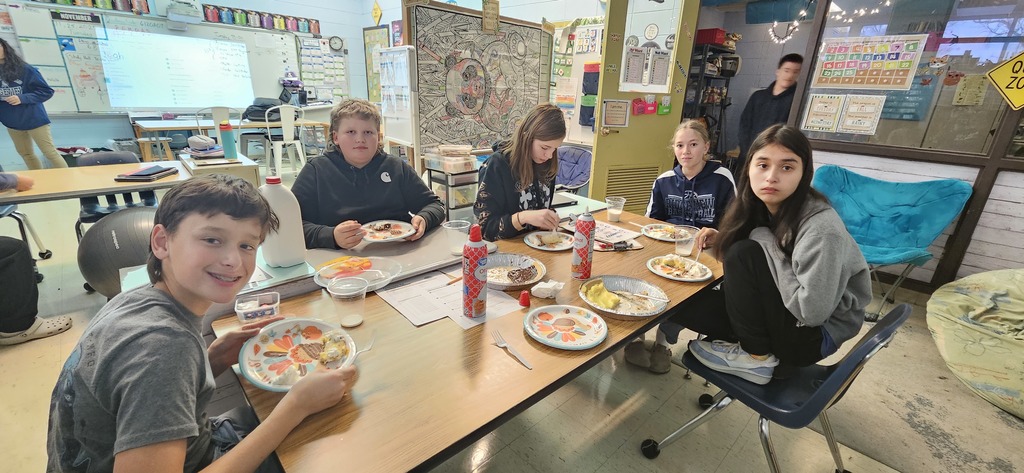 Students making a pie.