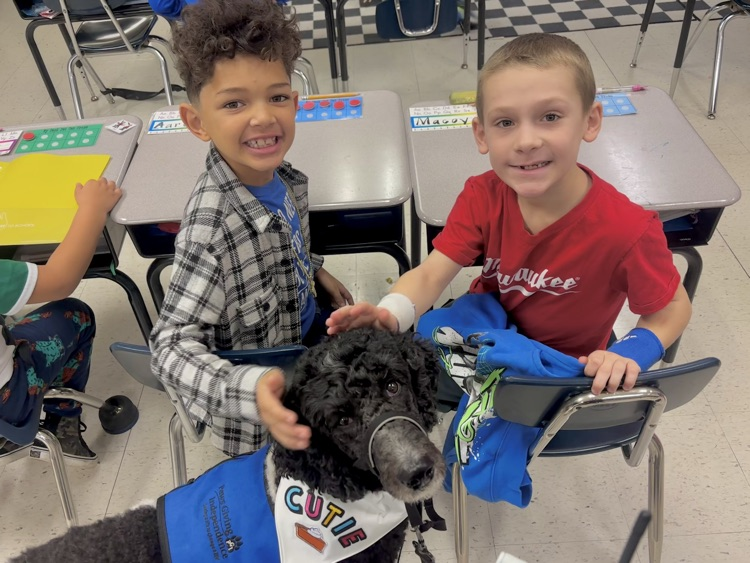 facility dog and students