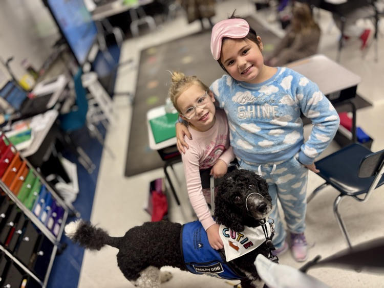 facility dog and students
