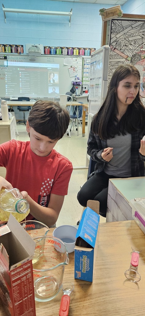 Students making brownies.