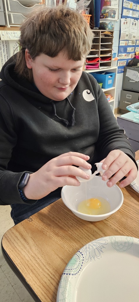 Students making brownies.