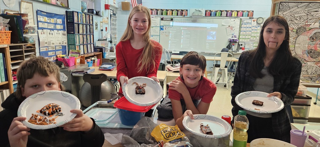 Students making brownies.