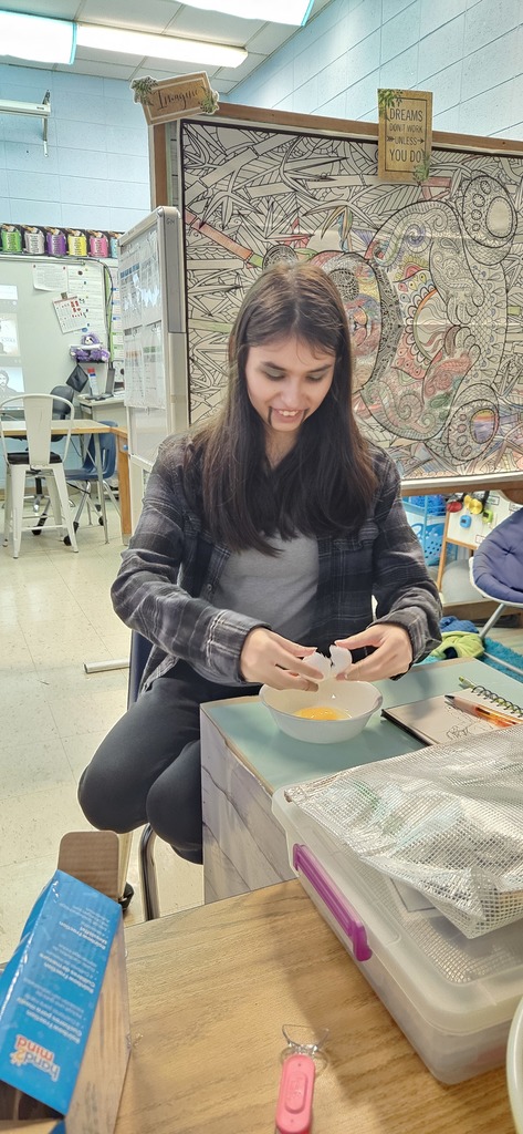 Students making brownies.