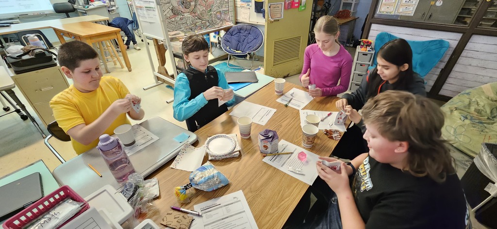 Students making hot chocolate.