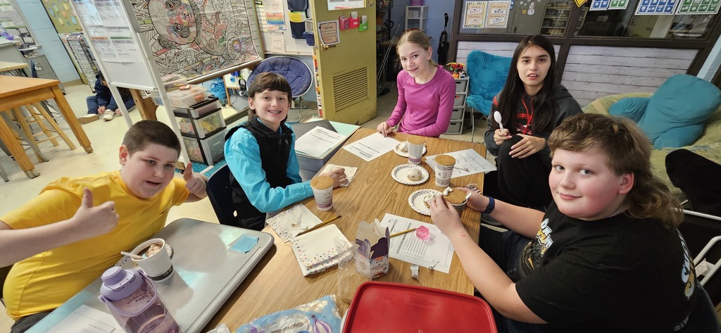 Students making hot chocolate.